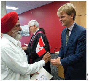 Immigration and Citizenship Minister Chris Alexander attends a citizenship ceremony in  Surrey, B.C. 