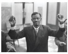 Patrice Lumumba, the Congo’s first democratically elected leader, raises his hands, injured by shackles, after being released from prison. He was later assassinated. (Photo: Nationaal Archief Fotocollectie Anefo)