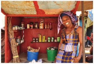 Fatou Kiné Fall left an abusive marriage and turned her life around with entrepreneurial training. Now she is the proud owner of a kiosk that sells cosmetics and toiletries to travellers. 