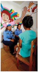 UN officials in Timor-Leste conduct an interview with a domestic abuse victim. 