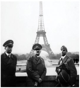 After his army rolled into Paris, Hitler himself showed up and had his picture taken in front of the Eiffel Tower. He is shown here, centre, with architect Albert Speer, left, and Arno Breker, right. (Photo: US National Archives and Records Administration)