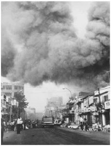 Black smoke covers areas of Saigon while fire trucks rush to the scene of fires set during attacks by the Viet Cong during the Tet holiday period in 1968. (Photo: U.S. government National Archives and Records Administration)