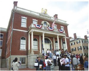 In 2017, 51 per cent of all international migrants in the world were living in only 10 countries, with the U.S. taking the highest number. Shown here is a "naturalization ceremony" on Citizenship Day in Salem, Mass.  (Photo:  Torsten Henning)