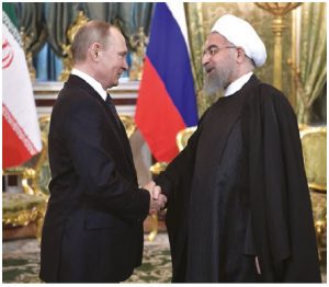 Russia President Vladimir Putin, shown here with Iranian President Hassan Rouhani, has been expanding Russia's economic ties to Iran, among other "outlaw" states.  (Photo: Kremlin.ru)