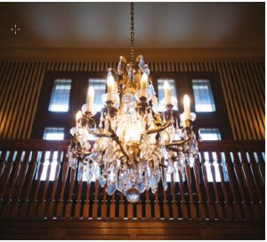The dramatic foyer features this chandelier and is two storeys tall. (Photo: Ashley Fraser)