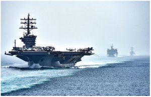 The aircraft carrier USS Dwight D. Eisenhower patrols the Strait of Hormuz, where Iran seized a British oil tanker earlier this year. As the Iran crisis intensifies, we could see a dramatic spike in oil prices, followed by a recession in late 2020. (Photo: Mass Communication Specialist 3rd Class J. Alexander Delgado)