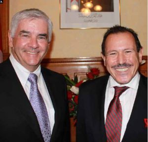 Algerian Ambassador Smail Benamara, right, hosted a national day celebration at his embassy in November. He’s shown with Lawrence Cannon, strategic adviser at Gowlings. (Photo: Ulle Baum)