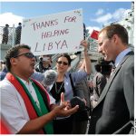 At an event marking the return of HMCS Charlottetown to the port of Halifax after a six-month deployment to the Mediterranean Sea, the Maritime Libya Association’s Fathi Ghanai tells Defence Minister Peter MacKay about the thanks he’s receiving from Libyans for Canada’s contributions in their country.