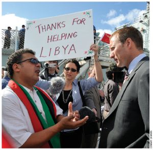 At an event marking the return of HMCS Charlottetown to the port of Halifax after a six-month deployment to the Mediterranean Sea, the Maritime Libya Association’s Fathi Ghanai tells Defence Minister Peter MacKay about the thanks he’s receiving from Libyans for Canada’s contributions in their country.