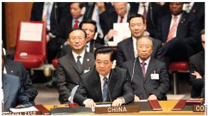 Chinese Ambassador Zhang Junsai argues that although China has, over the past 62 years, lifted more than 200 million Chinese out of poverty, the country, run by President Hu Jintao, above, is still considered a developing nation. 