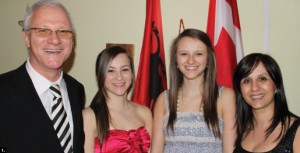 Albanian Ambassador Besnik Konci concluded his Ottawa posting this spring. He’s shown at his farewell reception with, from left, his daughters, Rea and Xheni, and his wife, Etleva Konci. (Photo: Ulle Baum) 