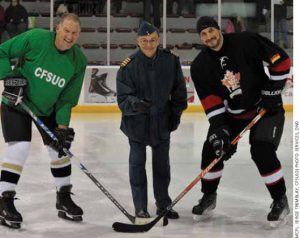 One of two annual games between the attachés and the Canadian Forces team (Canadian Forces Support Unit, Ottawa) took place at the Ottawa University Arena Nov. 23. The puck was dropped by Colonel Robert Perron for General Walter Natynczyk and German attaché Lt. Col. Kay Kuhlen.