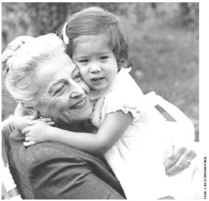 Pearl S. Buck, in the 1960s, hugging one of the children helped by Pearl S. Buck International 