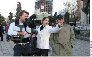 From left: Neil Barrett, director of photography, with film director Rachel Goslins, and photographer Norman H. Gershman on set in Tirana, Albania. 