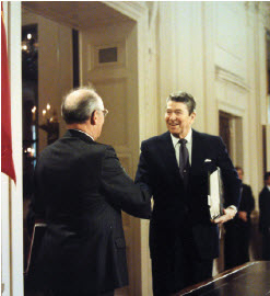 U.S. President Ronald Reagan greets Soviet Union President Mikhail Gorbachev