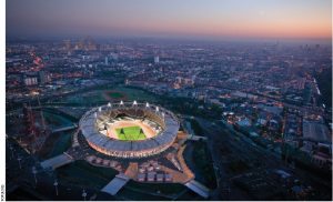 The sun sets over Olympic Stadium in London.