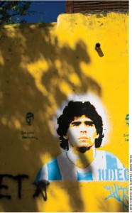 Diego Maradona, above in street graffiti and below during the World Cup final, scored a truly divine — and winning — goal in the semi-final match between Argentina and England. His team went on to beat Germany in the final. 