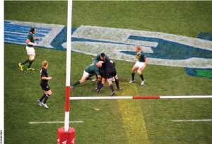 Nelson Mandela, shown in 2006, wore the jersey of South Africa's rugby team, the Springboks,  when they won the Rugby World Cup against the New Zealand All Blacks in 1995. In the 2010 photo above, the Sprinkboks and All Blacks have a rematch. 