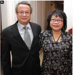 . Brunei High Commissioner Rakiah Lamit, right,  hosted a national day reception at the high commission in March. Thai Ambassador Udomphol Ninnad attended. (Photo: Sam Garcia) 