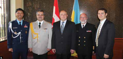 2. The embassy of Ukraine held a reception to mark Armed Forces Day. From left, Korean defence attaché Col. Soo Wan Lee, Ukrainian defence attaché Col. Ihor Likarenko, Ukraine chargé d’affaires Mykhailo Khomenko, National Defence director Capt. S.C.Bertrand and Ukraine’s second secretary Denys Sienik. 