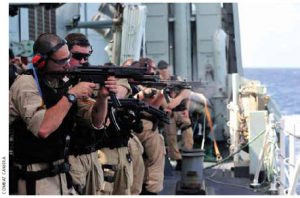 A boarding party team conducts a small-arms proficiency shoot onboard HMCS Charlottetown in the Gulf of Aden while on Operation ARTEMIS in May.