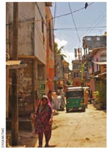 Many sectors of Colombo remain poor, but the streets and sidewalks bustle with traffic and pedestrians as small shops serve local commerce.