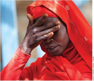 A woman from Kassab camp for Internal Displaced Persons (IDP), in Kutum (North Darfur), shows her sorrow for the increase of rapes in the area. 