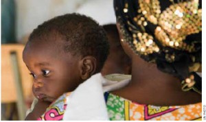 A mother and child in Kigali’s Village of Hope. The Rwandan Women Network in Kigali shelters genocide widows and their families and offers medical and educational services and business training. 