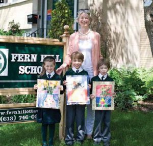 Children from Fern Hill School took part in an art contest sponsored by the Netherlands Embassy called “van Gogh goes to school.” Simone Bakker, second secretary for cultural and political affairs at the embassy, visited the school and children, from left, Marika Garzoni, Connor Douglas (grandson of former Canadian ambassador William Clarke) and Rohan Vermeij. (Photo: Natasha Moine)