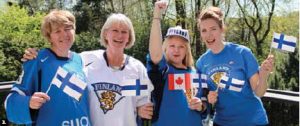 Finnish Ambassador Risto Piipponen and his wife, Marjatta, hosted a gathering to watch the men’s championship hockey game between Canada and Finland. From left, Finnish fans Deborah Nieminen, Marjatta Piipponen, Linda Keep and Petra Erkkila. (Photo: Ulle Baum) 