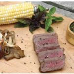 Grilled steak with chimichurri sauce (recipe page 68).