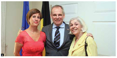 2. In July, Belgian Ambassador Bruno van der Pluijm and his wife, Hildegarde, hosted a national day reception at their residence. At right, chief of protocol Margaret Huber. (Photo: Sam Garcia)
