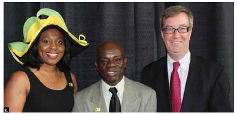 A flag-raising for Jamaica’s 50th anniversary of independence took place at City Hall in August. From left, Jamaican High Commissioner Sheila Sealy-Monteith, Elisha Campbell, president of the Jamaica-Ottawa Community Association, and Mayor Jim Watson. (Photo: Joan Wright) 