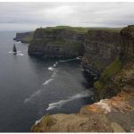 The grand scale of the eight-kilometre expanse of sheer stone at the cliffs of Moher astonishes visitors.