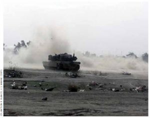 A Marine Corps battle tank fires in Iraq during the U.S. invasion in 2003.