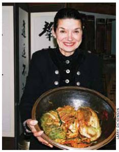 Margaret Dickenson prepares her own  kimchi.