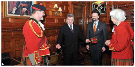The 78th Fraser Highlanders Pipe & Drum Corps and Honour Guard hosted a reception to welcome Macedonian President Gjorge Ivanov, middle left. Also in attendance, from left, Bruce MacRae, Macedonian Ambassador Ljuben Tevdovski and Grete Hale.