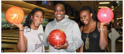 The Canadian Federation of University Women’s diplomatic hospitality group hosted its first bowling event at McArthur Lanes. Zambian High Commissioner Bobby Mbunji Samakai, centre, took part with his daughters, Victoria (left) and Precious (right). (Photo: Ulle Baum)