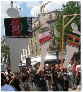 Protesters demonstrate during the gay pride parade in Paris against penalties for gays in several countries, including Nigeria, Saudi Arabia, Pakistan and Yemen. 