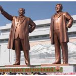 North Koreans bow in front of the statues of Kim Il Sung and Kim Jong Il on Mansu Hill in Pyongyang.