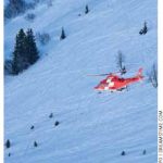 A Swiss helicopter makes a rescue. The country has one of the lowest child mortality rates and highest life expectancies.