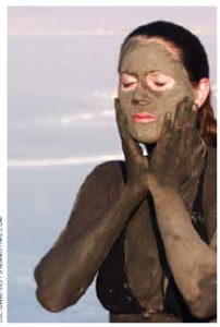 A woman gives herself a mask from mud in Israel’s Dead Sea. Nearly eight of 10 Israelis report their health is good to very good. 