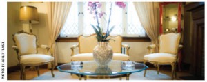 A sitting room shows off the leaded windows. 