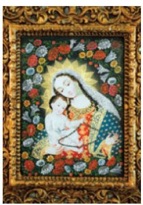 Madonna and Child are dressed in traditional Peruvian clothing. 