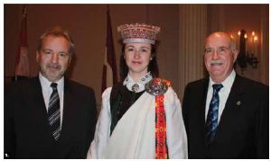 From left, Latvian Ambassador Juris Audarins, first secretary Sanita Ulmane and MP Garry Breitkreuz at a reception to mark Latvia’s national day. (Photo: Ulle Baum)