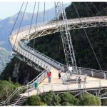 Reachable by thrilling cable car ride, Langkawi's curved suspension sky bridge provides great views of Langkawi Island, Malaysia.