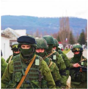 Soldiers without insignia on march in Perevalne, Crimea. Vladimir Putin conceded in April that they were Russian troops.