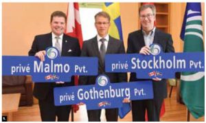 From left, South-Nepean Councillor Steve Desroches, Swedish Ambassador Teppo Tauriainen and Mayor Jim Watson mark the naming of three new streets in Riverside South. The namings commemorate the ties that the City of Ottawa has built with Sweden Ericsson, Ikea, Volvo, H & M and the Ottawa Senators hockey club. (Photo: City of Ottawa) 