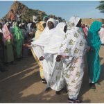 Sudan 2008: A celebratory dance in Kortala, thanking my partner LCdr Janan Sutherland, for arranging to have an addition built on one of the girls’ schools (Kortala, Sudan)