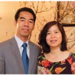 Ambassador To, with his wife, Tran Phi Nga, who wears an Ao Dai, a hand-painted silk dress traditional in Vietnam.